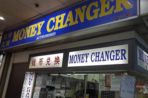 Cambiar moneda en Singapur